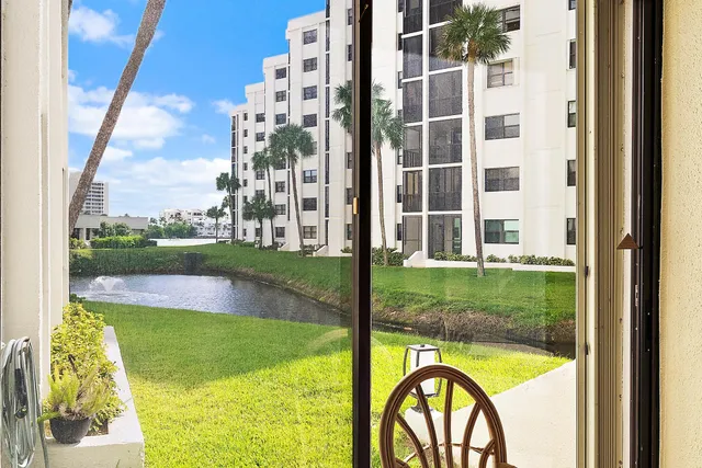 a view of swimming pool from a balcony