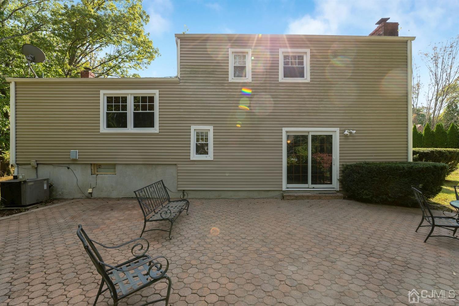 26 Donald Road East Brunswick, NJ 08816 - Photo 27 of 27 a backyard of a house with seating space