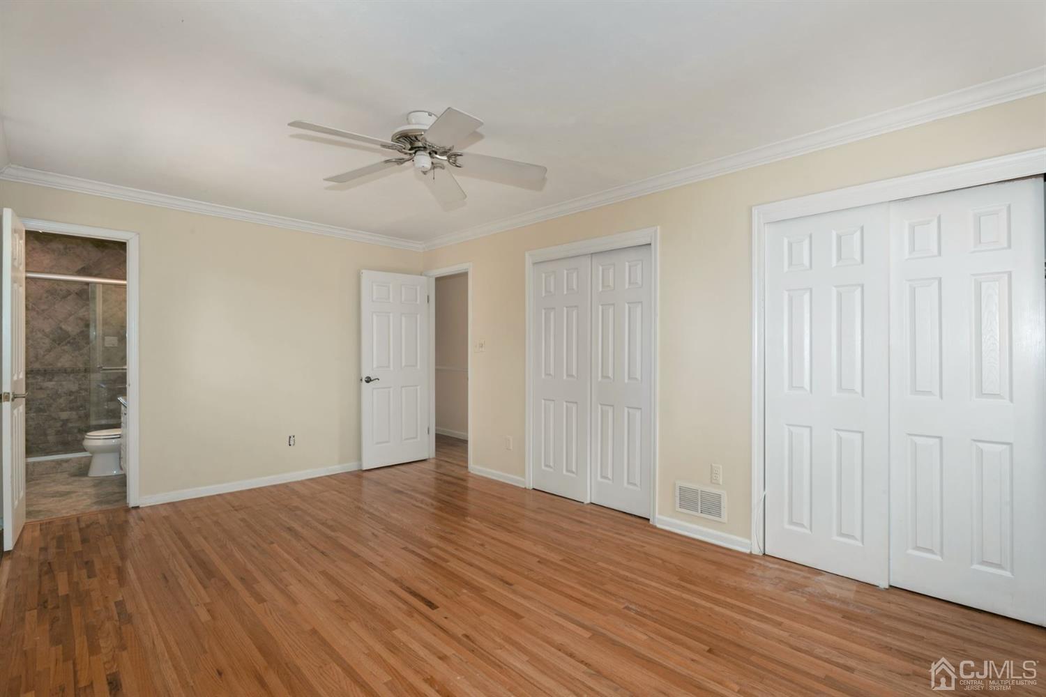 26 Donald Road East Brunswick, NJ 08816 - Photo 10 of 27 a view of an empty room with wooden floor