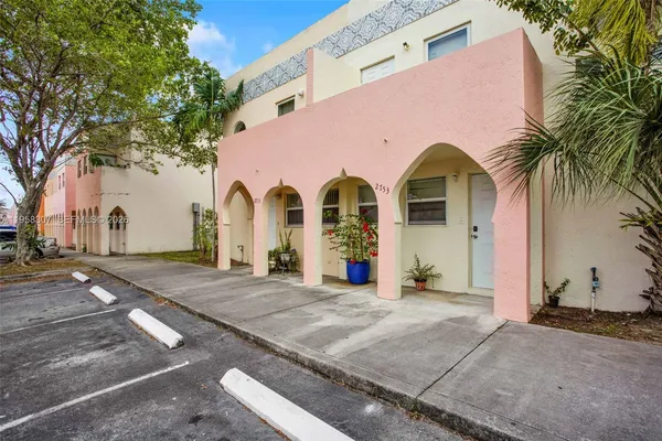 a front view of a house with yard