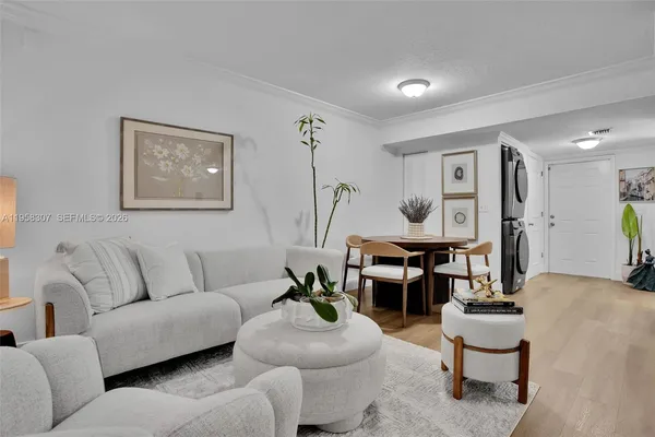 a living room with furniture and a table