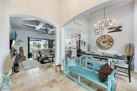 a living room with furniture and a clock