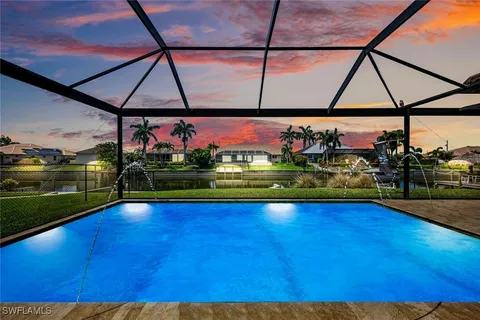 a view of outdoor space with swimming pool