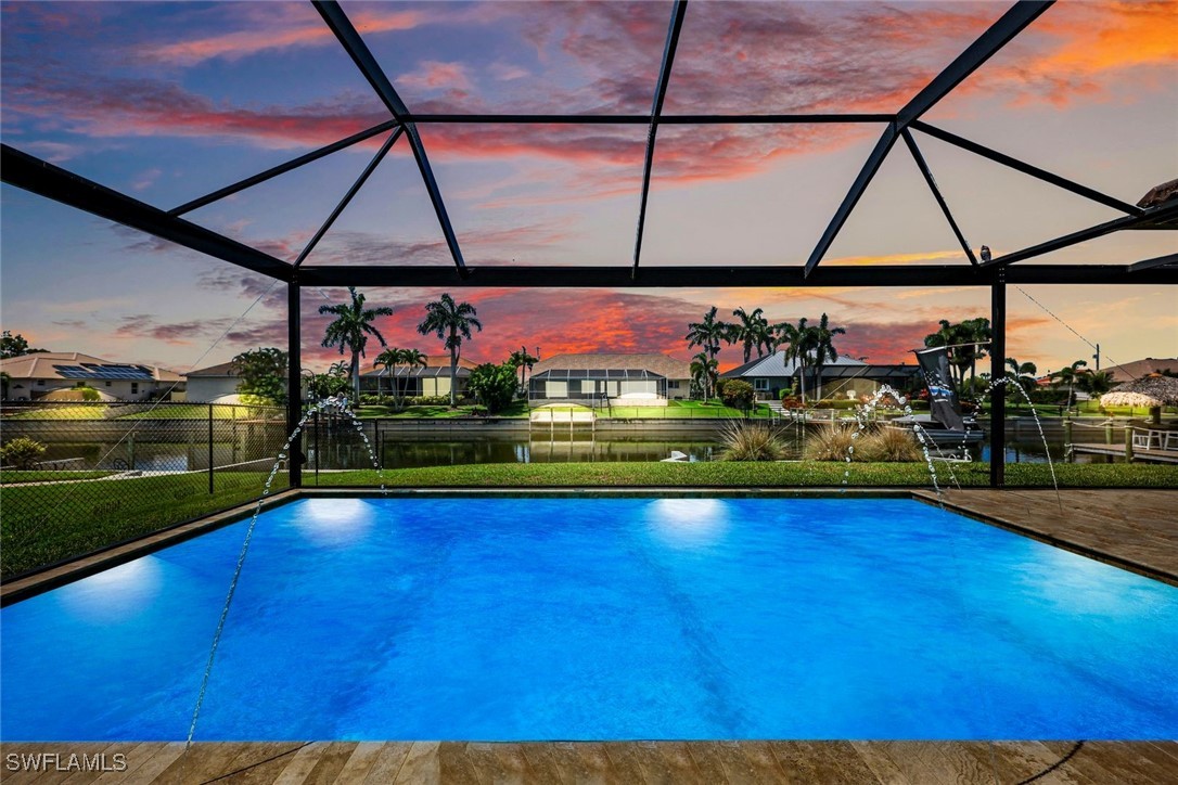 208 Southwest 15th Street Cape Coral, FL 33991 - Photo 2 of 50 a view of outdoor space with swimming pool