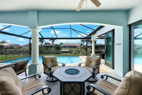 a view of swimming pool yard from a seating space