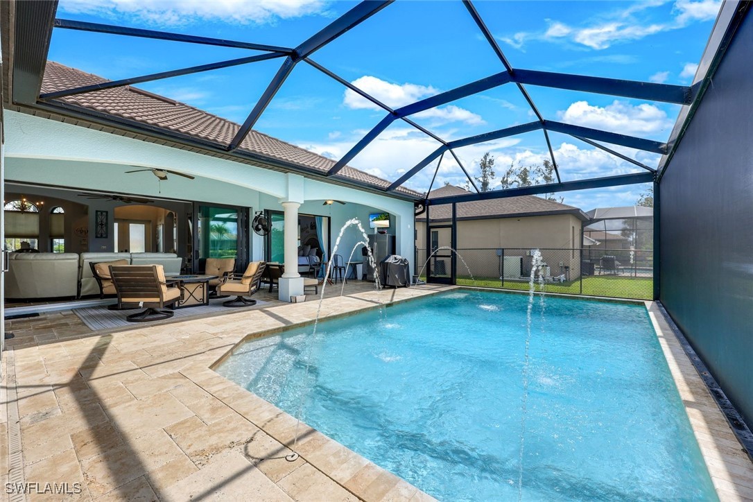 208 Southwest 15th Street Cape Coral, FL 33991 - Photo 31 of 50 a view of a backyard with a patio and a patio