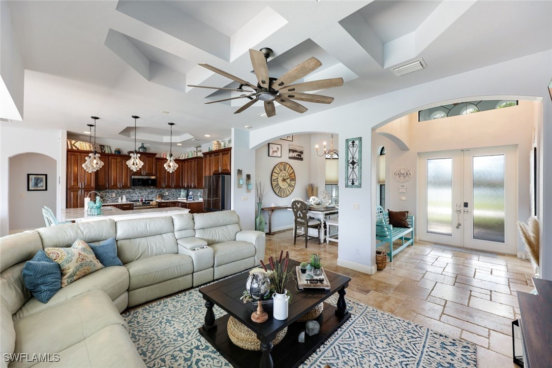 208 Southwest 15th Street Cape Coral, FL 33991 - Photo 5 of 50 a living room with furniture and a large window