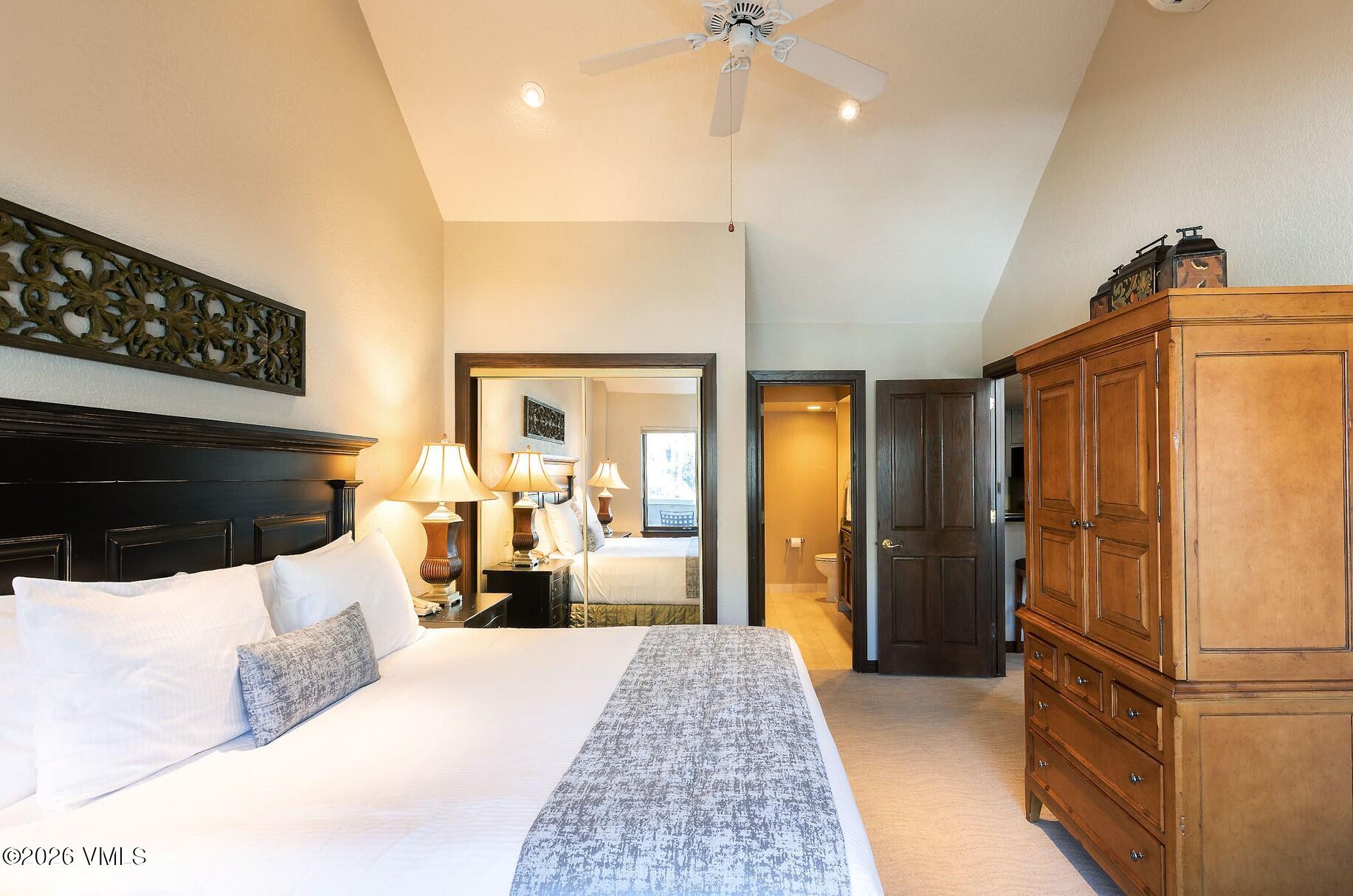 210 Offerson Road, Unit R421 WEEK 3 Beaver Creek, CO 81620 - Photo 14 of 24 a bed room with a bed and a view of bathroom