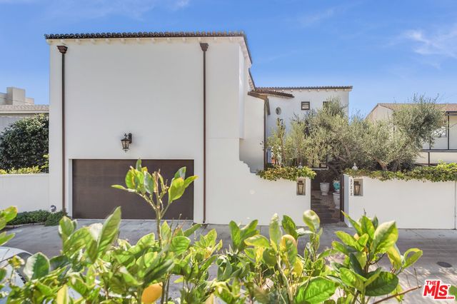 a vase of flowers sitting on a table