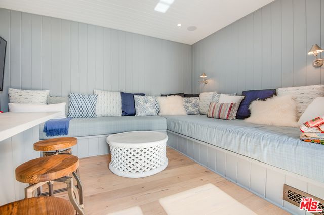 a living room with furniture and a couch