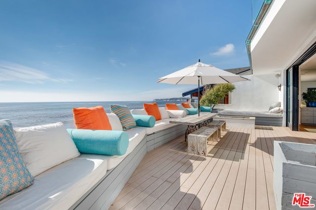 swimming pool view with seating space