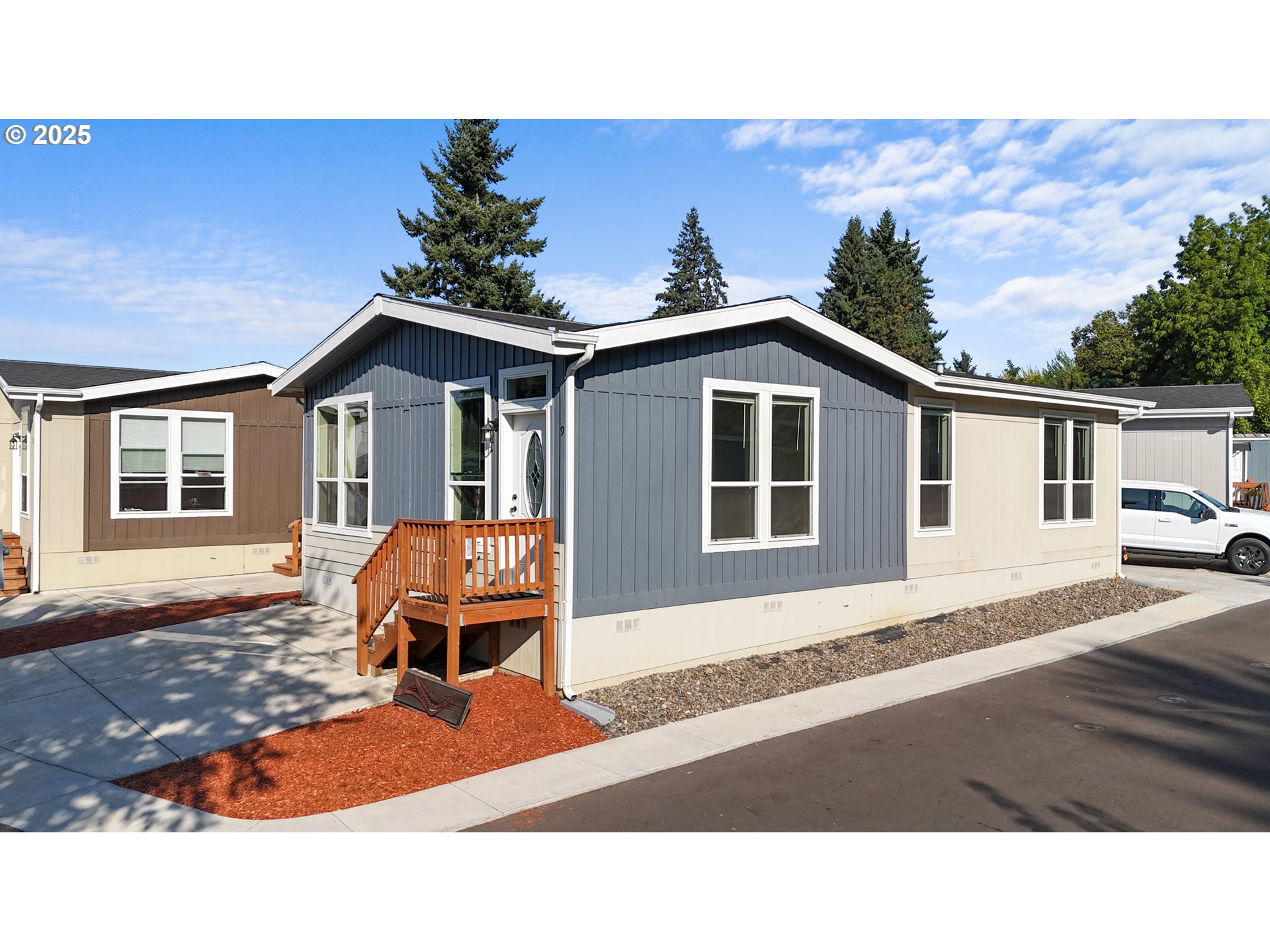 9700 Southwest Tualatin Road, Unit 9 Tualatin, OR 97062 - Photo 2 of 18 a black and white photo of a house