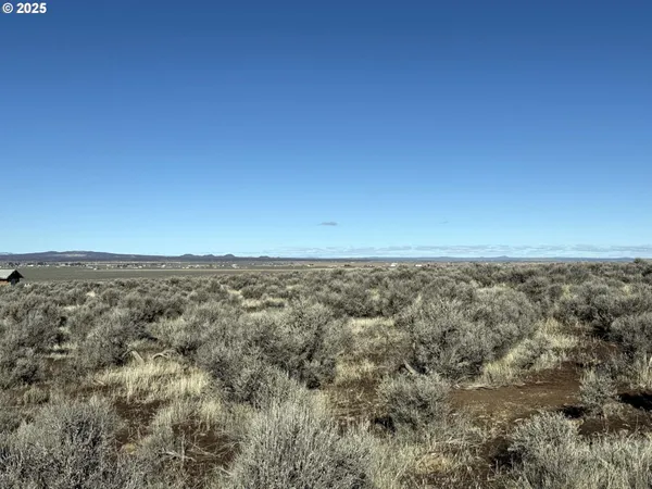 an aerial view of residential space with city view