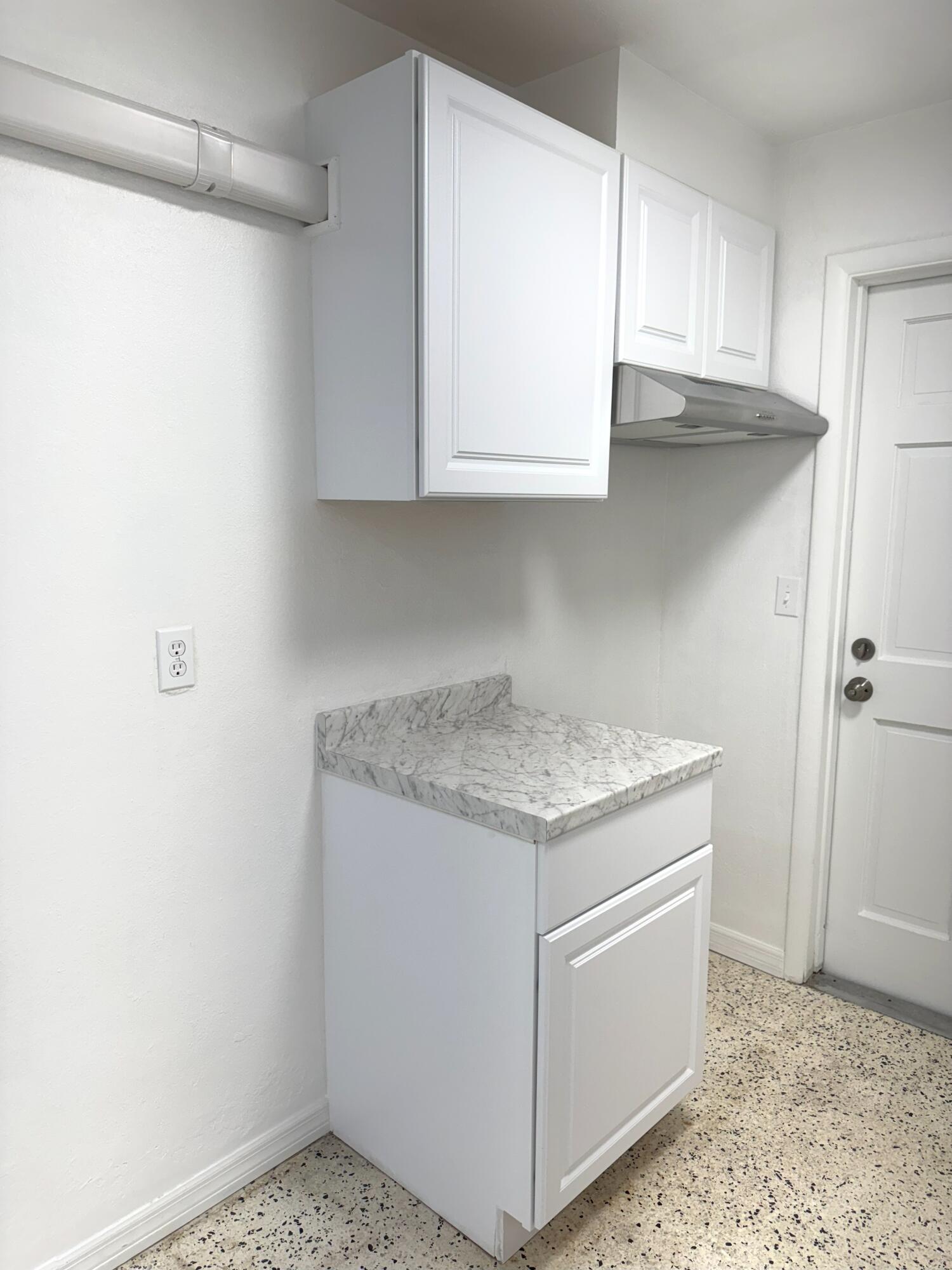 225 Southwest 2nd Street, Unit 1 Belle Glade, FL 33430 - Photo 2 of 11 Kitchen2