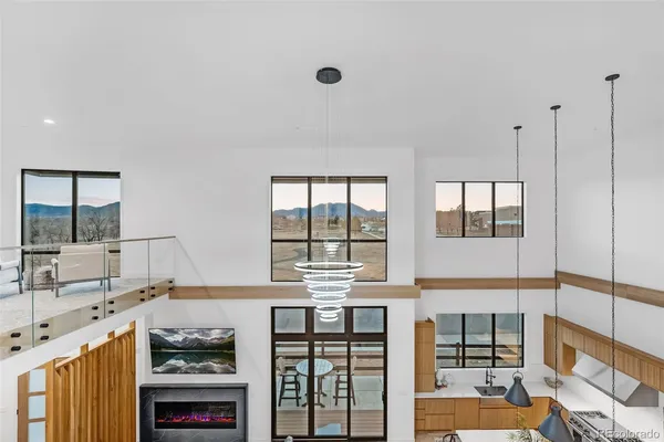a open kitchen with a sink and cabinets