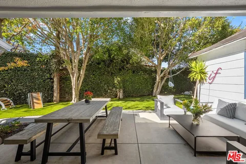 a view of a swimming pool with a lounge chairs