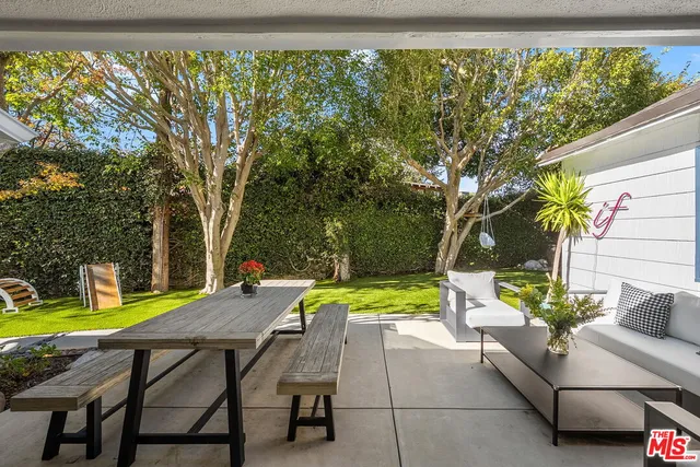 a view of a swimming pool with a lounge chairs
