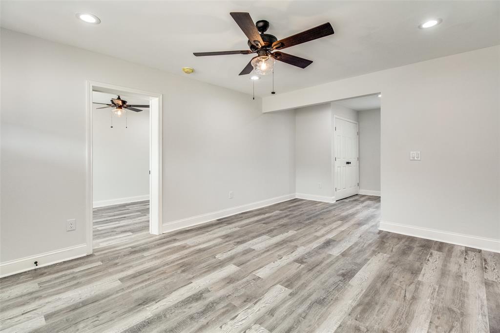 1201 Ridgewood Road Denison, TX 75020 - Photo 18 of 29 Spare room featuring light hardwood / wood-style flooring and ceiling fan