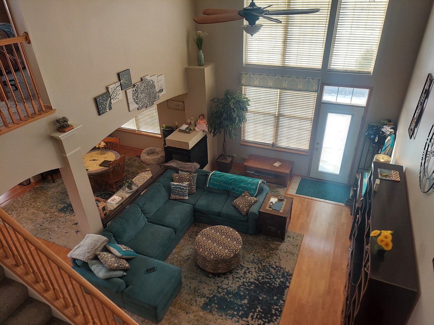 1022 Eineke Boulevard, Unit 1022 Algonquin, IL 60102 - Photo 13 of 18 a living room with furniture and a floor to ceiling window