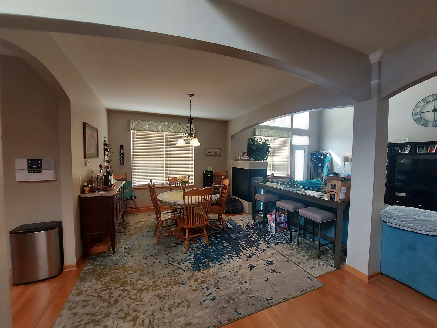 1022 Eineke Boulevard, Unit 1022 Algonquin, IL 60102 - Photo 6 of 18 a view of a dining room with furniture window and wooden floor