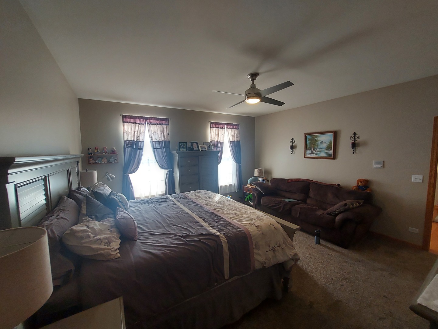 1022 Eineke Boulevard, Unit 1022 Algonquin, IL 60102 - Photo 7 of 18 a spacious bedroom with a bed and wooden floor