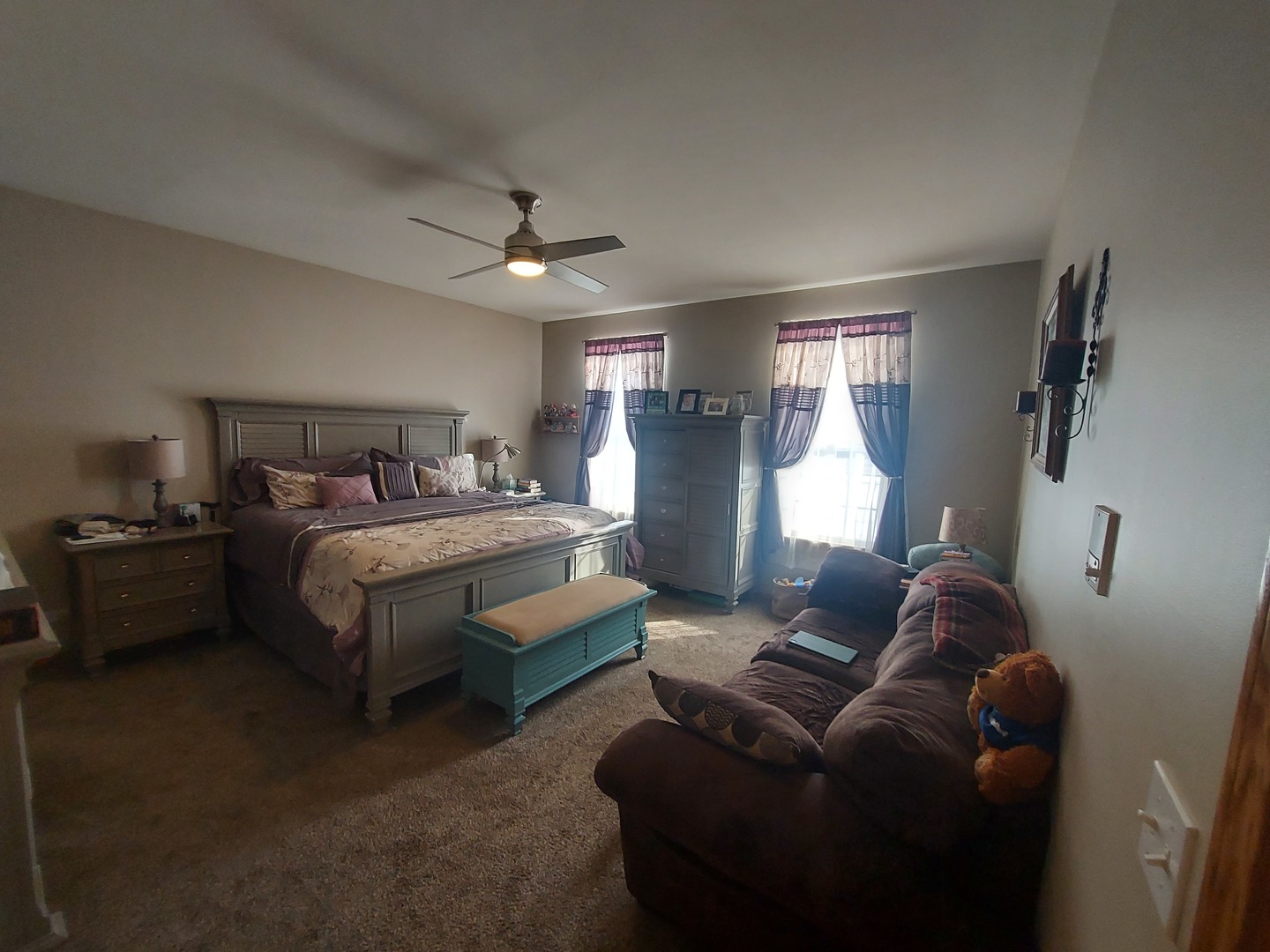 1022 Eineke Boulevard, Unit 1022 Algonquin, IL 60102 - Photo 8 of 18 a bedroom with a bed couch and window