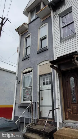 a car parked in front of a building