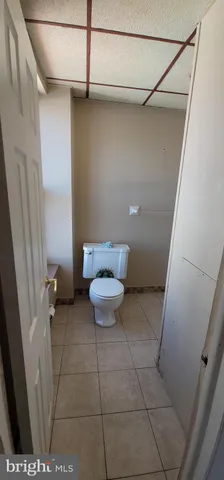 a bathroom with a sink and toilet