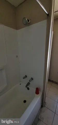 a kitchen with stainless steel appliances granite countertop a refrigerator and a stove