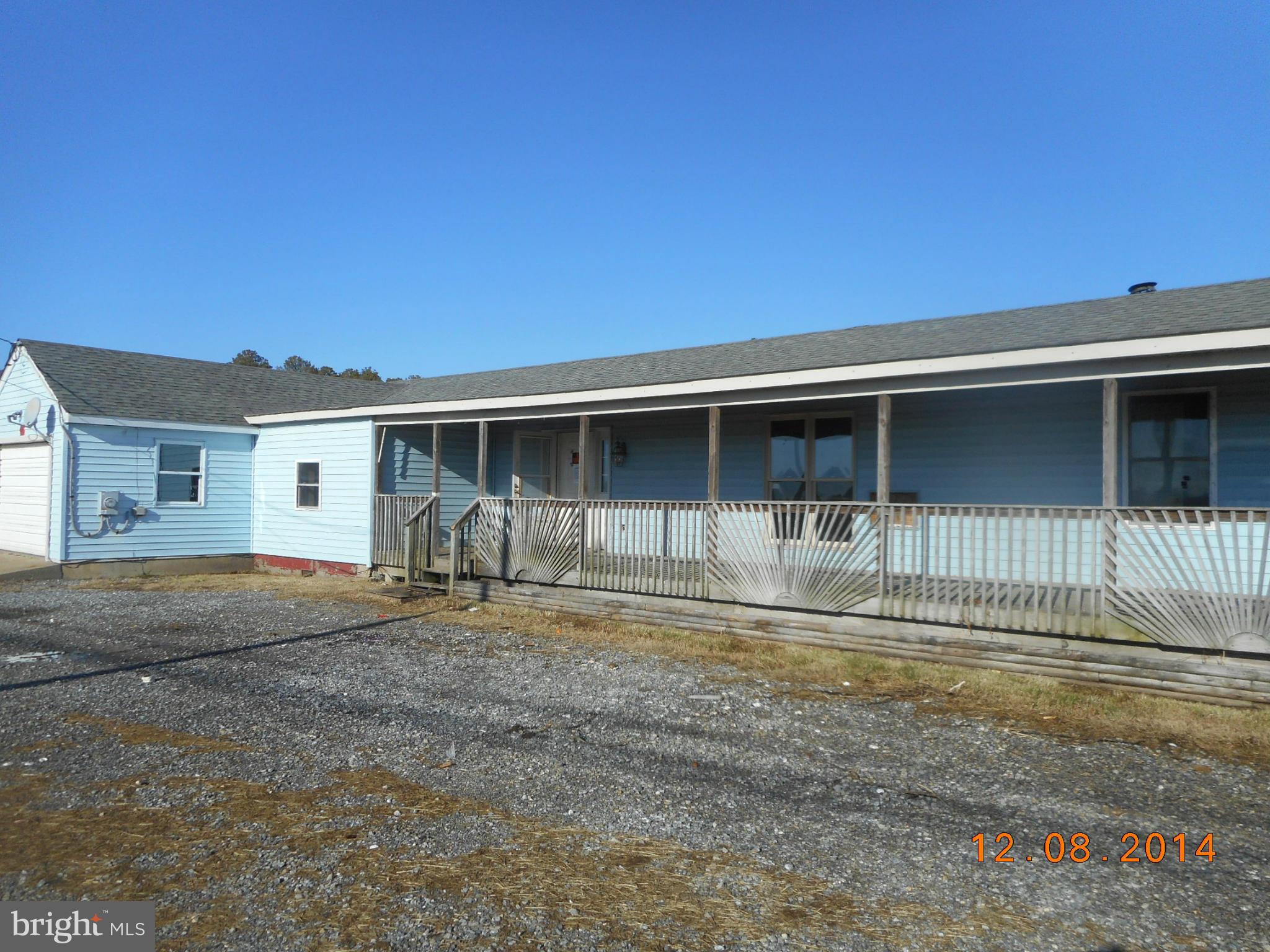 2313 Wingate Bishops Head Road Wingate, MD 21675 - Photo 1 of 18 a front view of a house with a yard