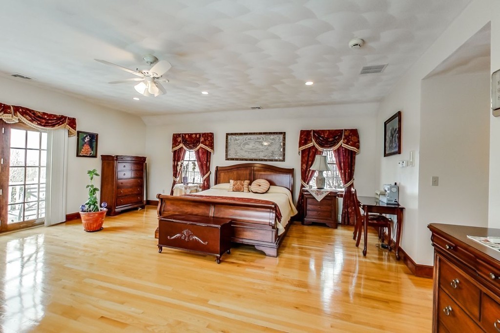 131 Range Heights Road Lynn, MA 01904 - Photo 20 of 30 a living room with furniture gym equipment and a window