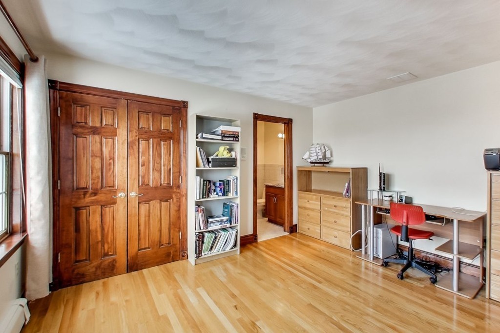 131 Range Heights Road Lynn, MA 01904 - Photo 24 of 30 a room with furniture and a closet