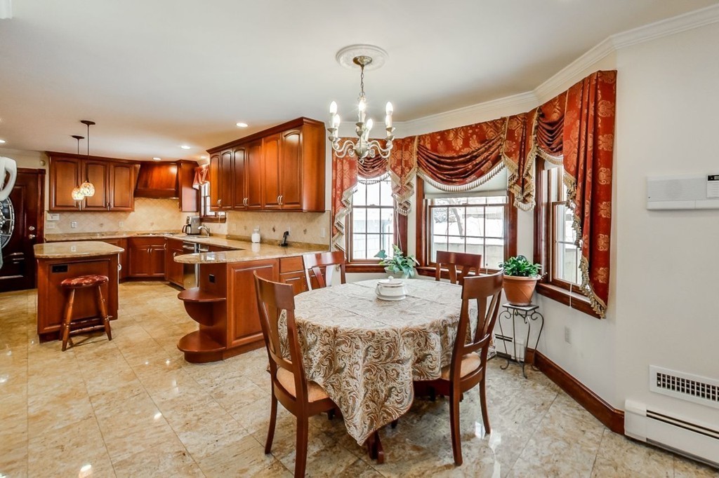 131 Range Heights Road Lynn, MA 01904 - Photo 7 of 30 a view of a dining room with furniture
