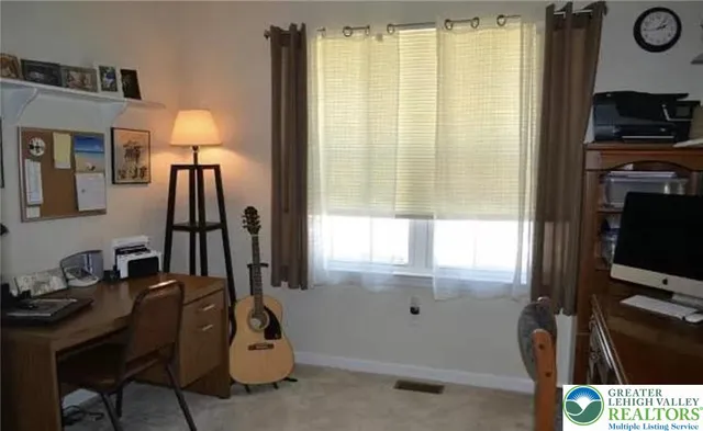 a room with window and gym equipment