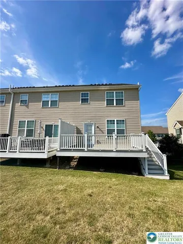a view of a house with a roof deck