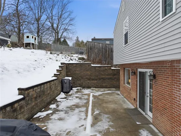 a view of a patio with a yard