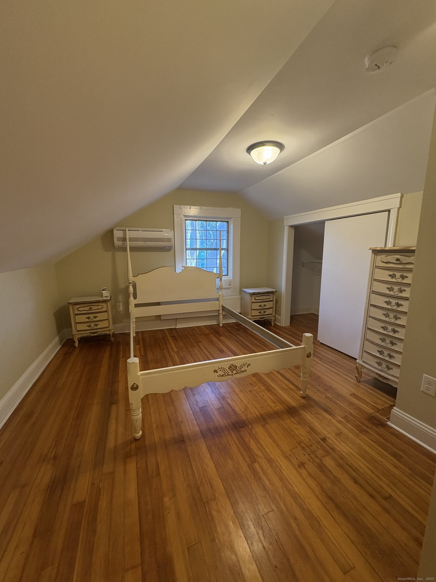 7 Coit Street, Unit 2 New London, CT 06320 - Photo 11 of 19 a view of a room with wooden floor and window