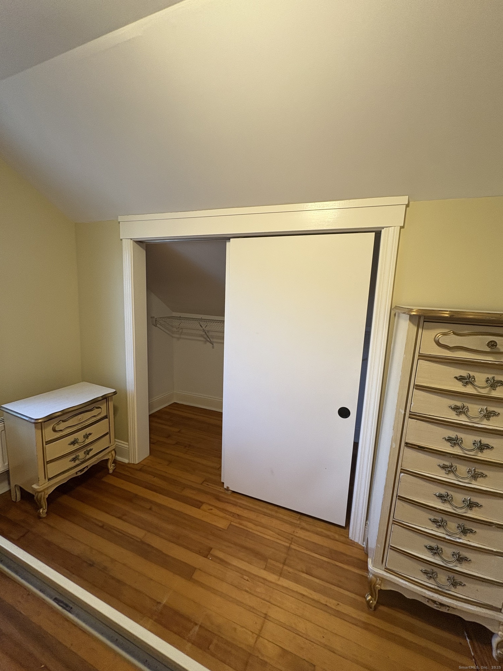7 Coit Street, Unit 2 New London, CT 06320 - Photo 12 of 19 a view of a room with wooden floor