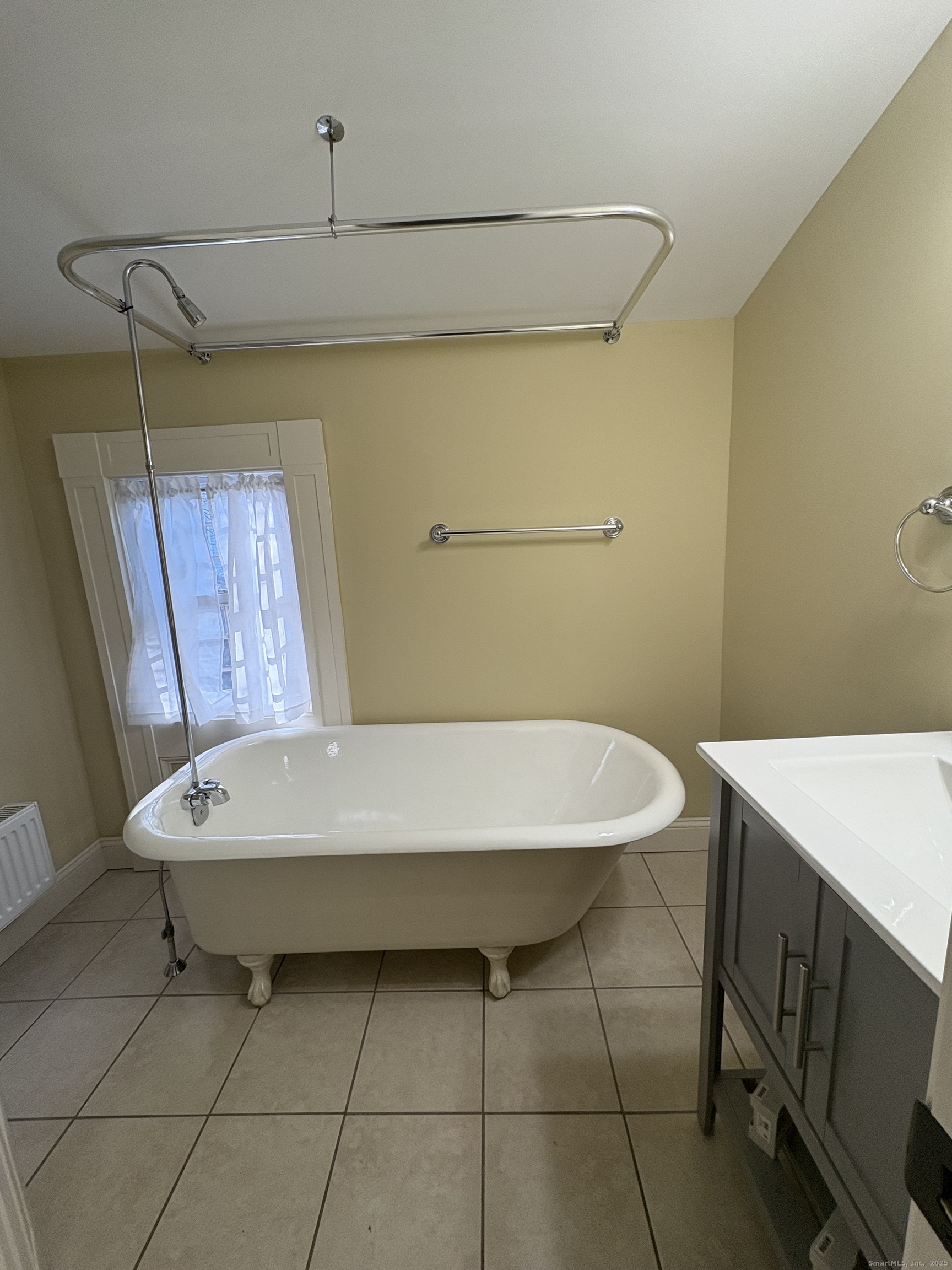 7 Coit Street, Unit 2 New London, CT 06320 - Photo 10 of 19 a room with a table and window