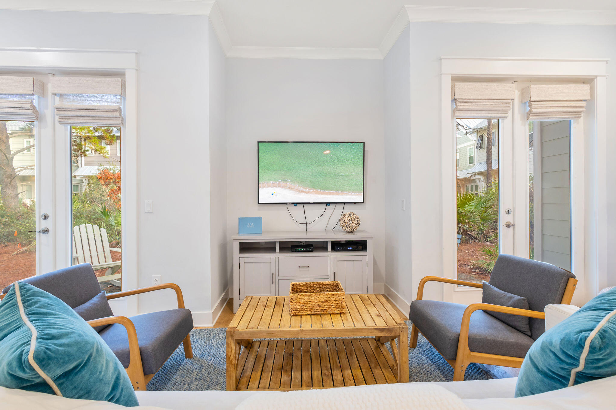 26 East E Pine, Unit A Inlet Beach, FL 32461 - Photo 11 of 53 a living room with furniture and a flat screen tv