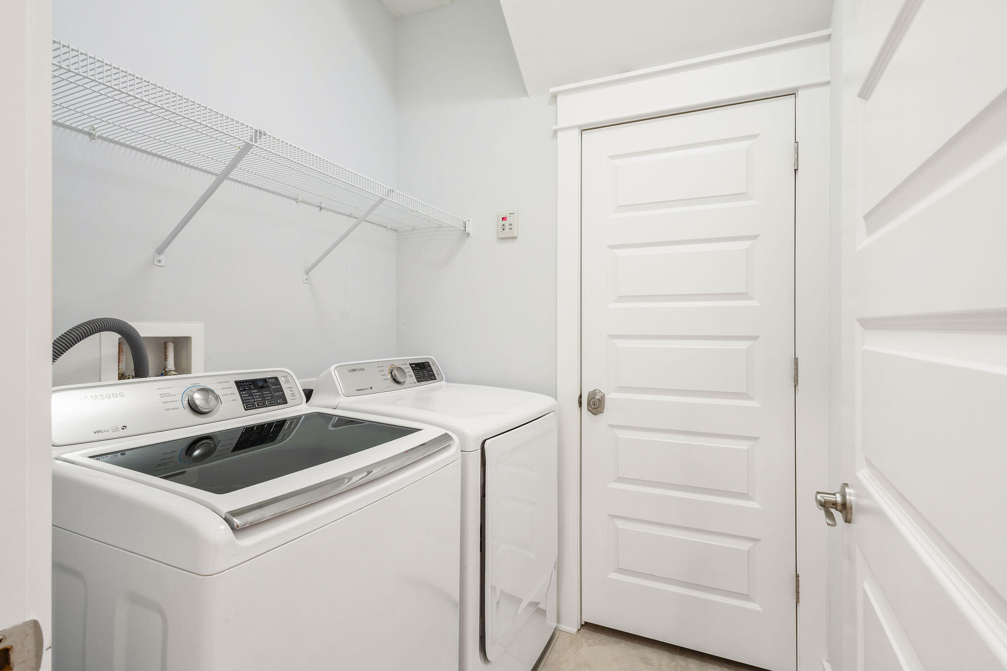 26 East E Pine, Unit A Inlet Beach, FL 32461 - Photo 22 of 53 a utility room with dryer and washer