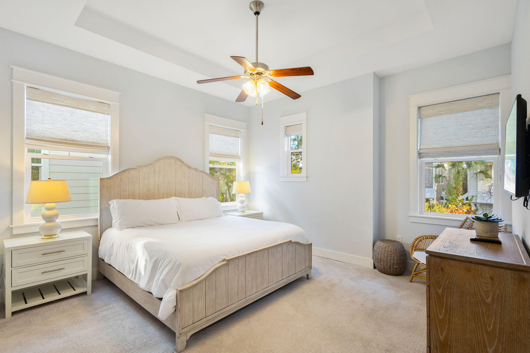 26 East E Pine, Unit A Inlet Beach, FL 32461 - Photo 30 of 53 a bedroom with a bed a couch and a window