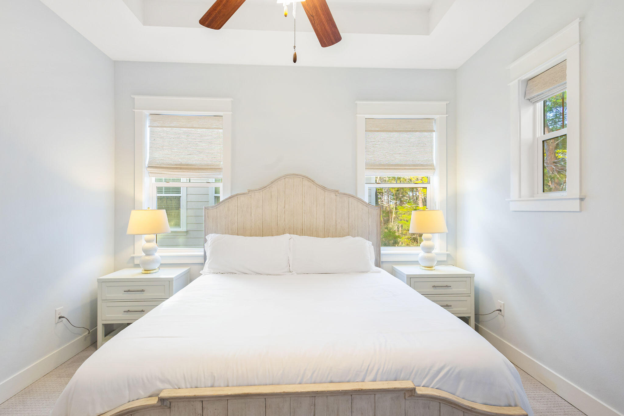 26 East E Pine, Unit A Inlet Beach, FL 32461 - Photo 31 of 53 a bedroom with a bed and wooden floor