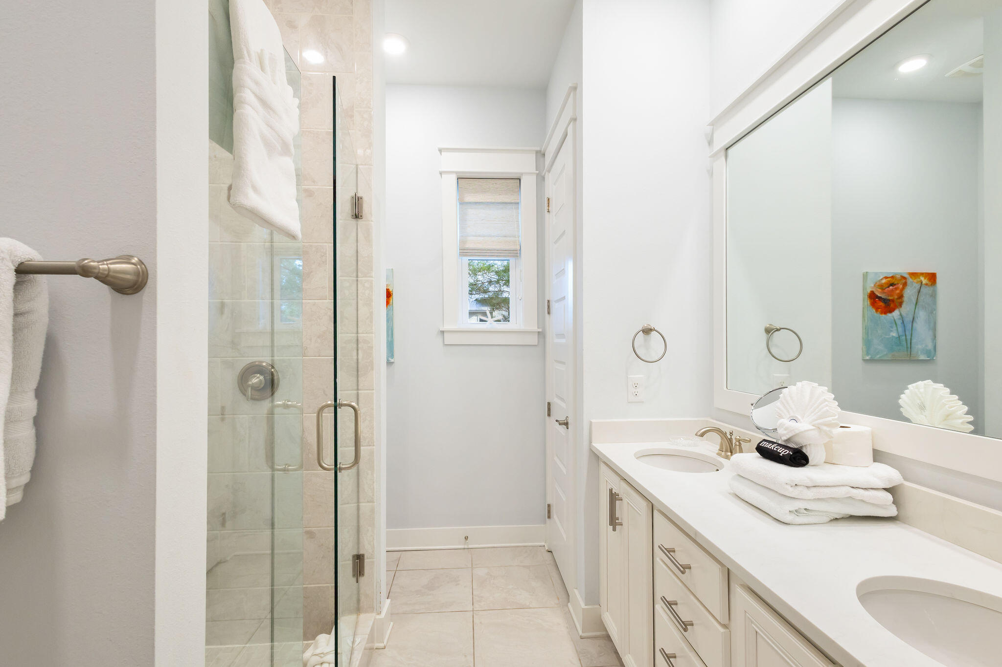 26 East E Pine, Unit A Inlet Beach, FL 32461 - Photo 34 of 53 a bathroom with a granite countertop sink mirror and shower