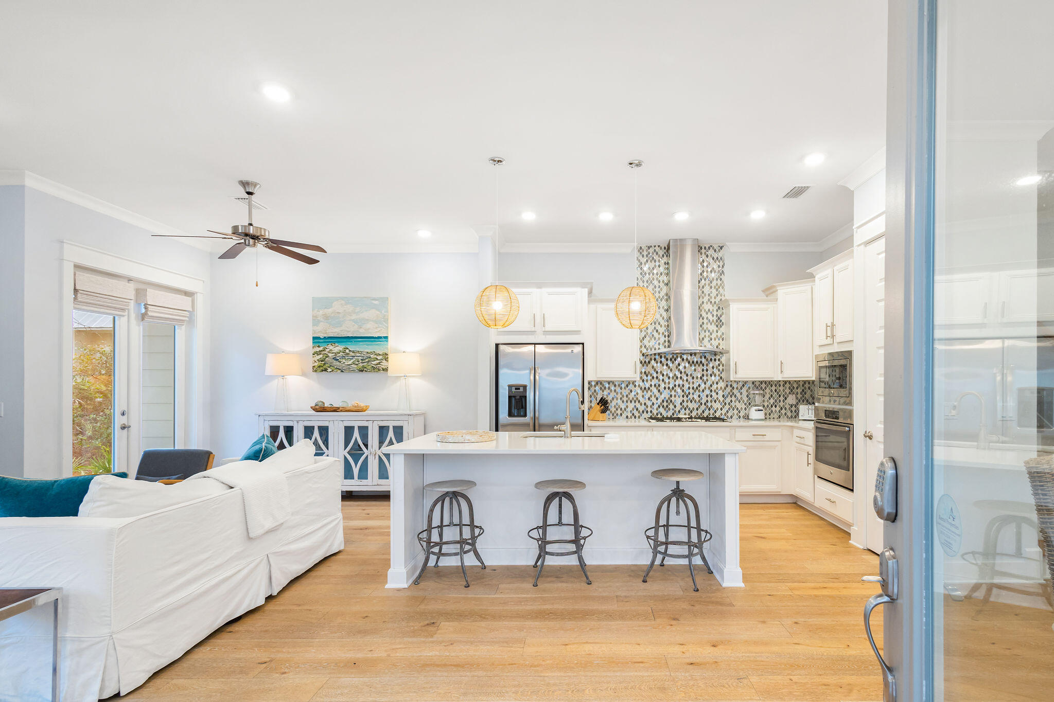 26 East E Pine, Unit A Inlet Beach, FL 32461 - Photo 7 of 53 a living room with kitchen island furniture and a fireplace