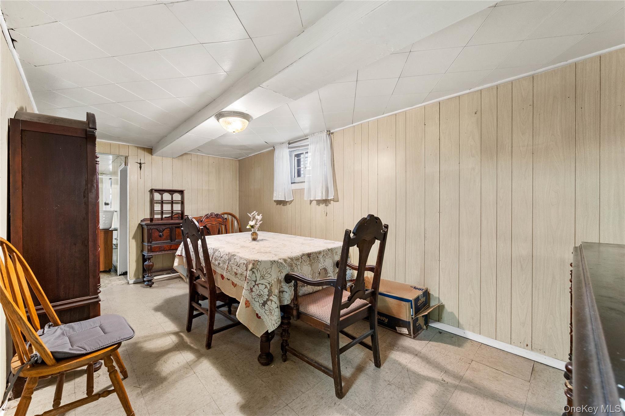 37-07 20th Road Queens, NY 11105 - Photo 16 of 24 a view of a dining room with furniture and a rug