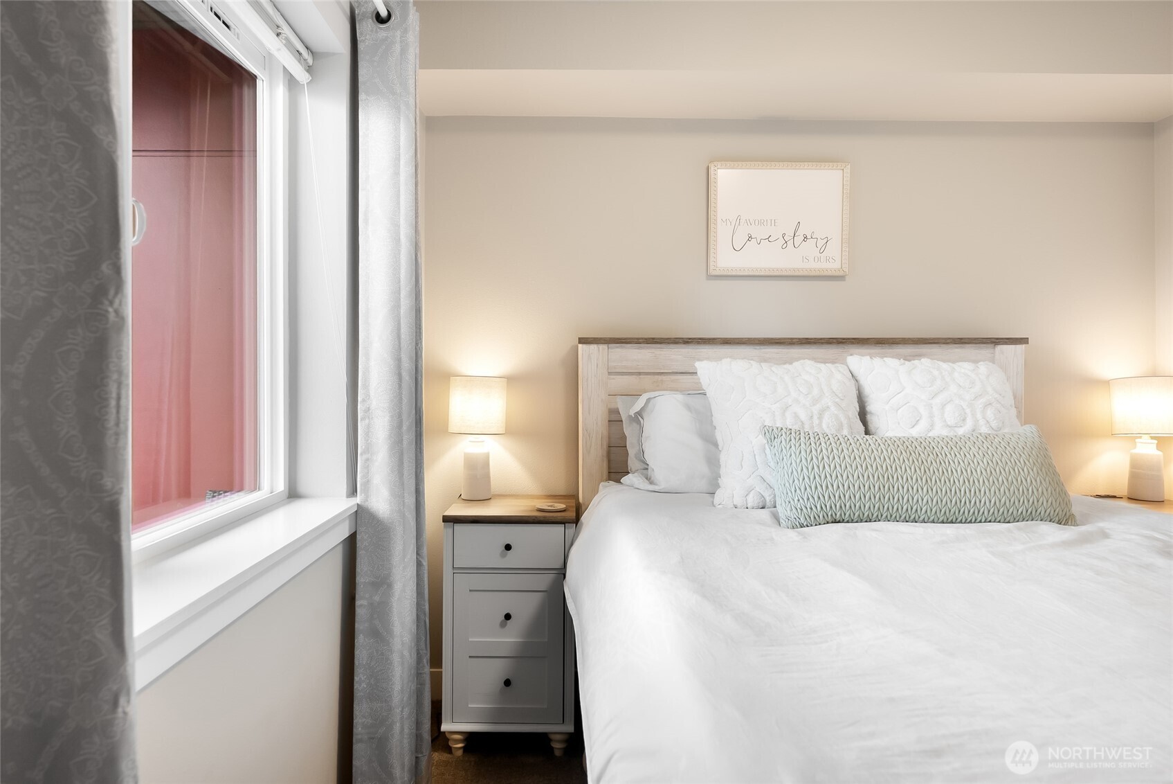 1882 Front Street, Unit 302 Lynden, WA 98264 - Photo 13 of 31 a bedroom with a bed and a window