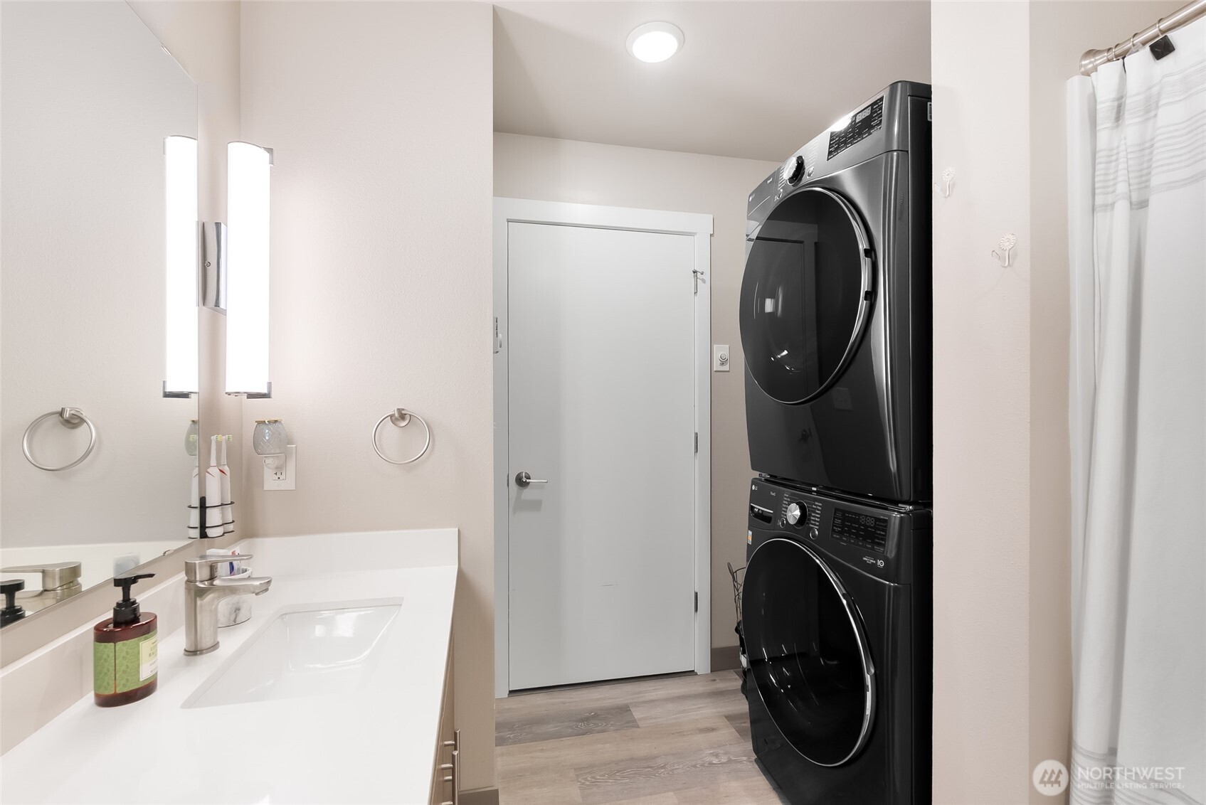 1882 Front Street, Unit 302 Lynden, WA 98264 - Photo 15 of 31 a bathroom with a sink mirror and toilet