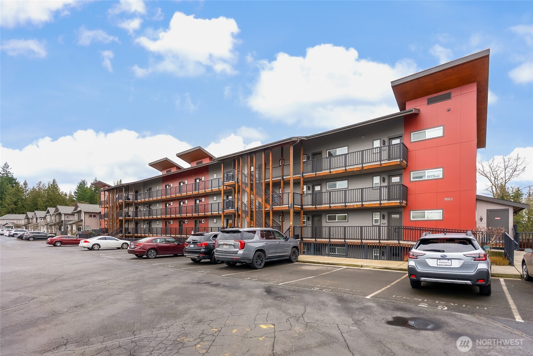 1882 Front Street, Unit 302 Lynden, WA 98264 - Photo 20 of 31 a car parked in front of a house