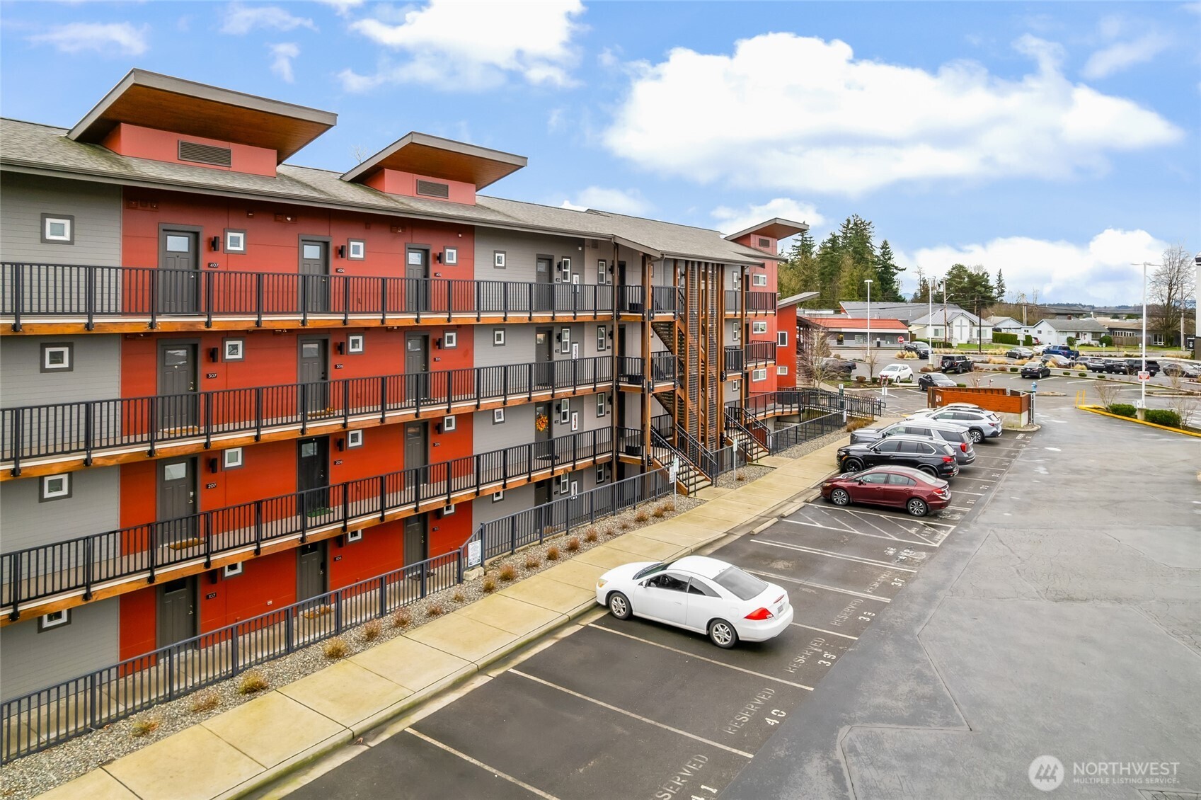 1882 Front Street, Unit 302 Lynden, WA 98264 - Photo 24 of 31 a cars parked in front of a building
